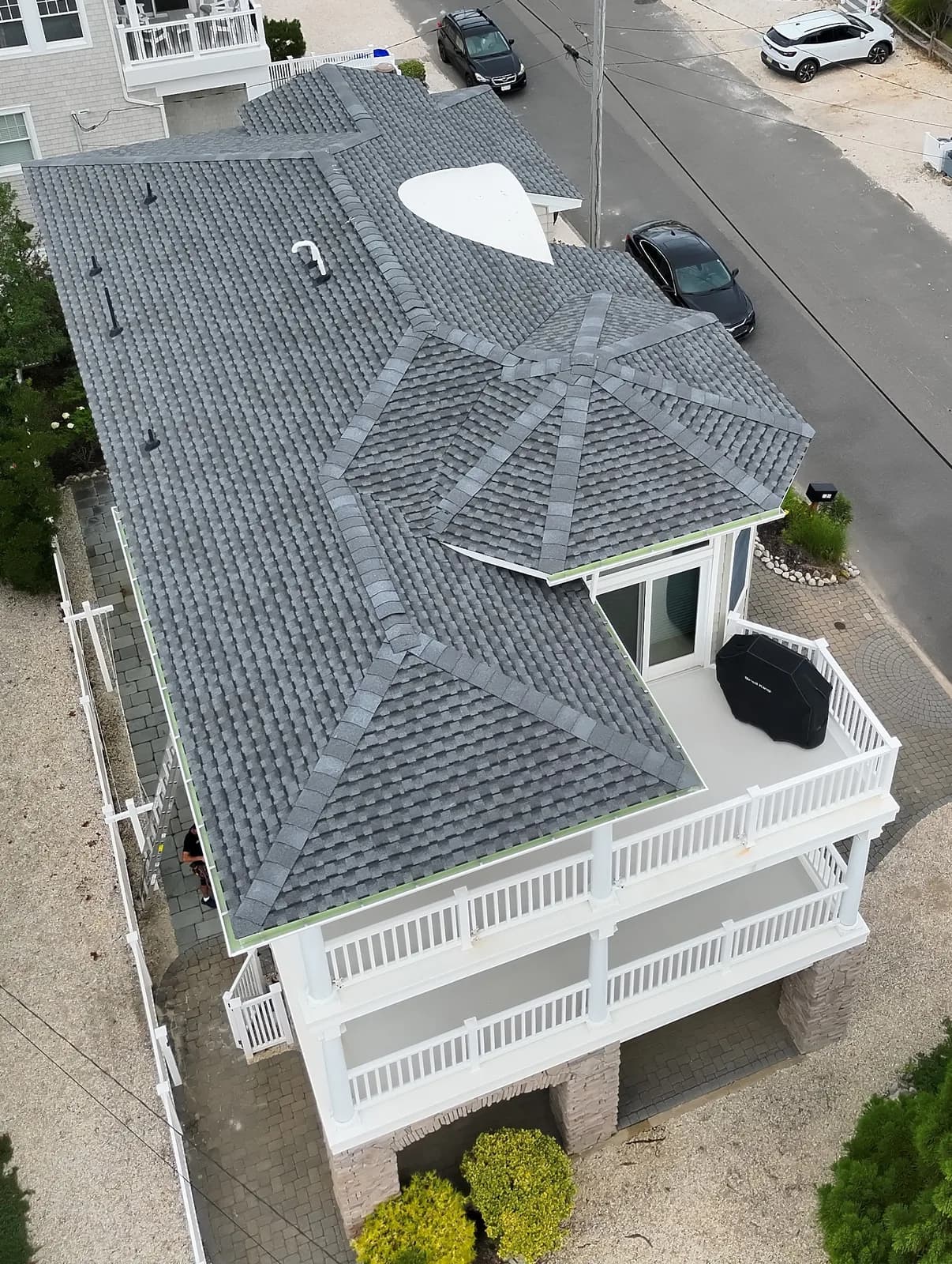Aerial view of the completed roof on a Beach Haven home